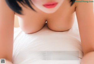 A woman wrapped in a towel leaning against a wall.